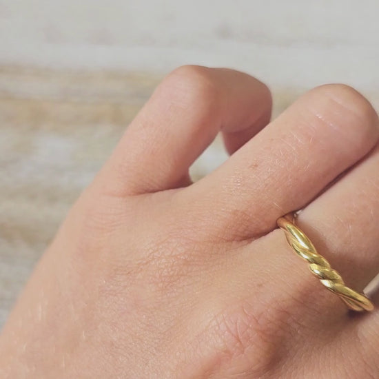 wrapped gold plated ring on hand